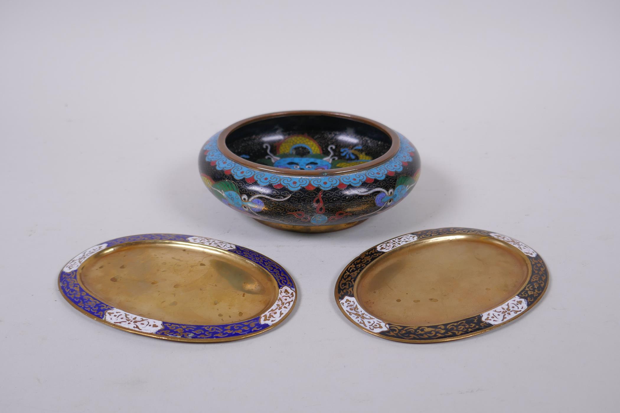A Chinese black ground cloisonne bowl with rolled rim and dragon decoration, and a pair of Thai oval - Image 2 of 7