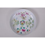 A Chinese late C19th famille rose porcelain cabinet plate decorated with peaches, bats, bamboo and