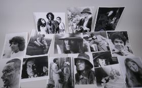 A quantity of black and white press and promotional photographs relating to films, including The