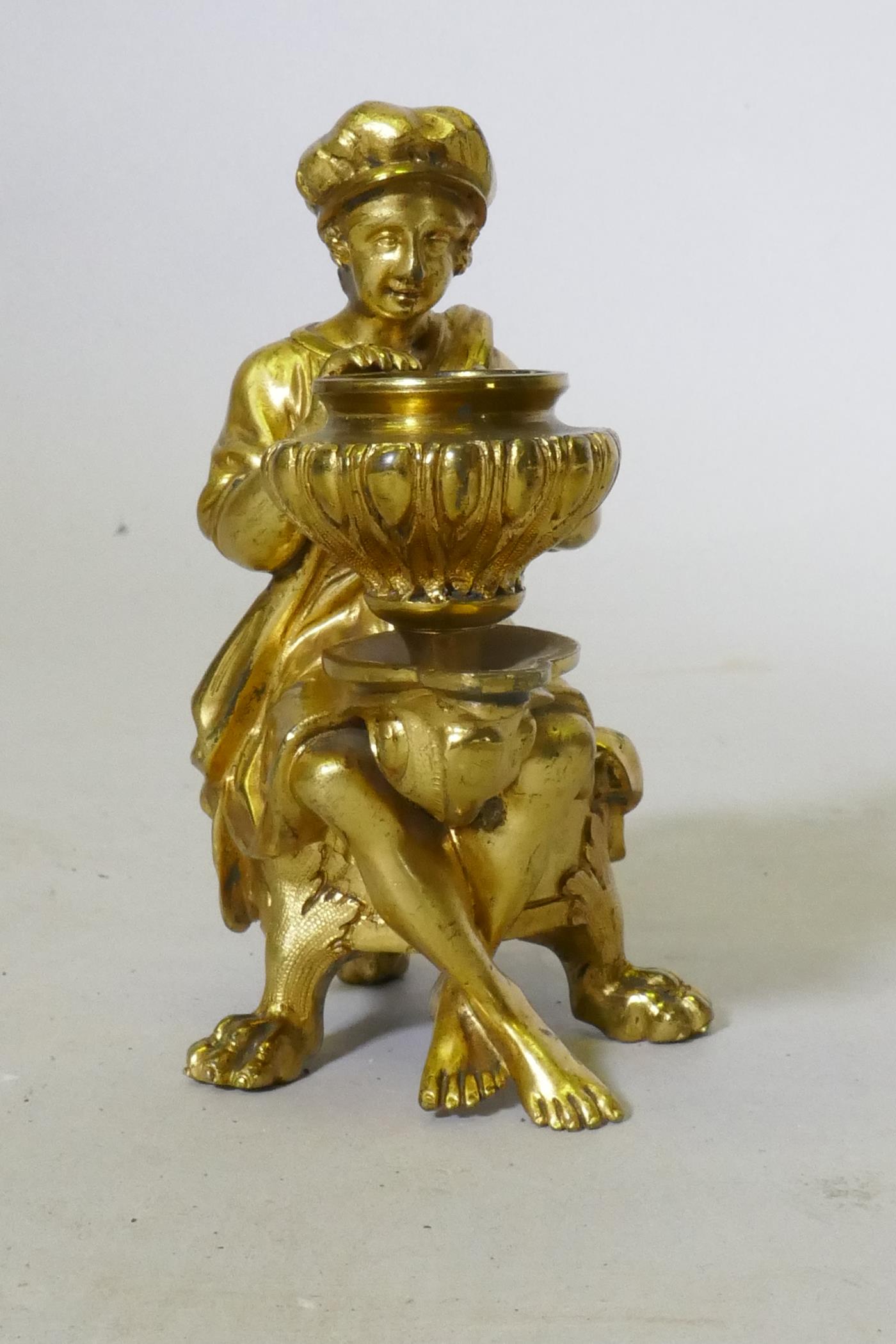 A fine Grand Tour ormolu bronze chamberstick in the form of a page seated upon a dolphin, C18th/ - Image 3 of 4