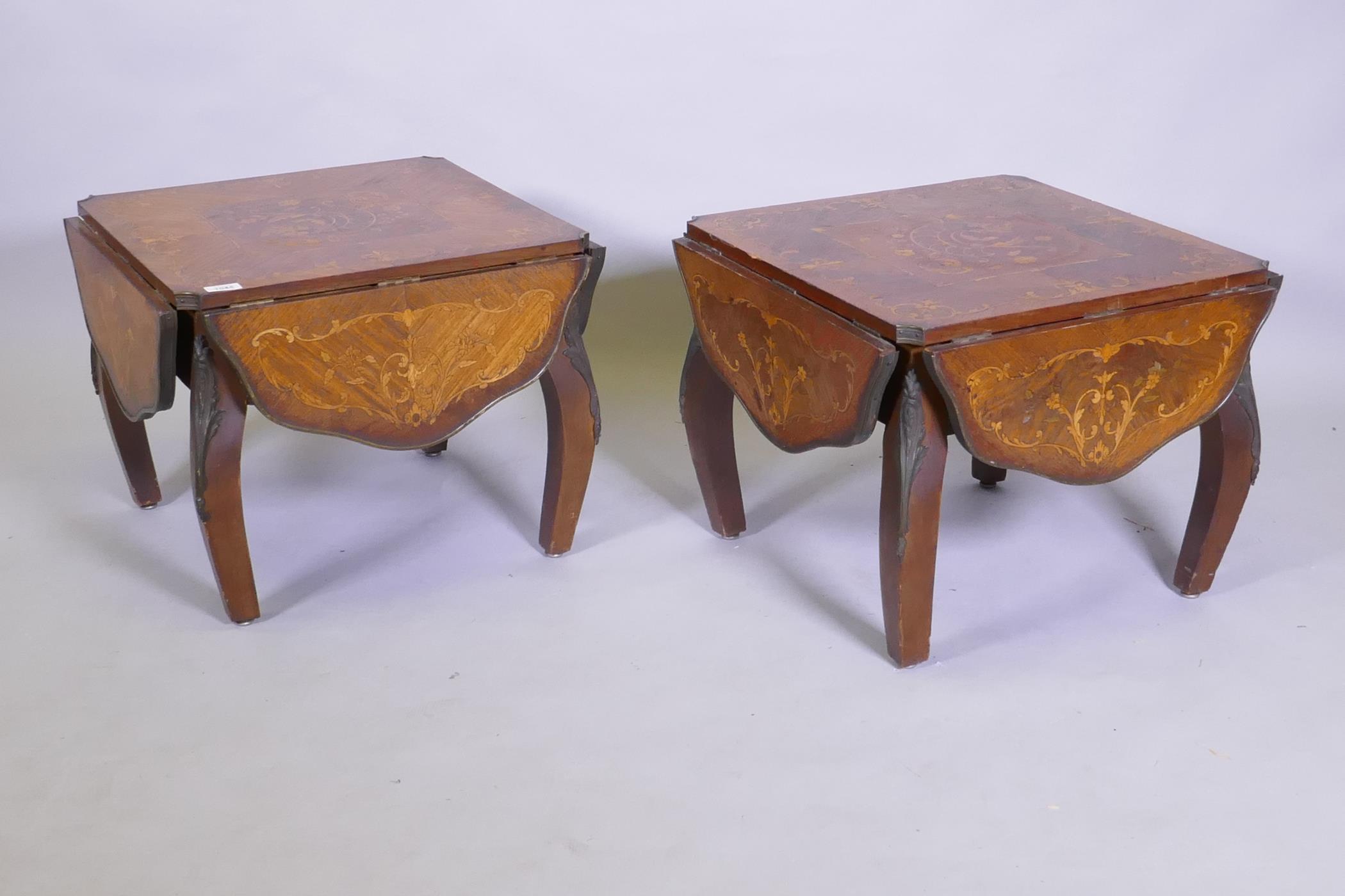 A pair of antique marquetry inlaid kingwood tables with a shaped top and ormolu mounts, reduced,