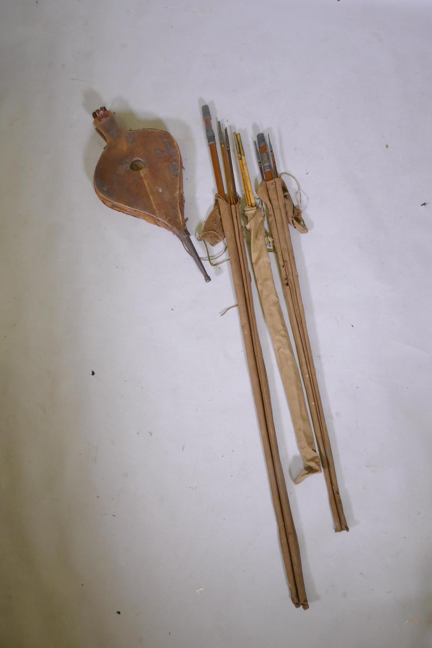 Two antique split cane fishing rods by Charles Farlow & Co, London, and a later split cane rod and a