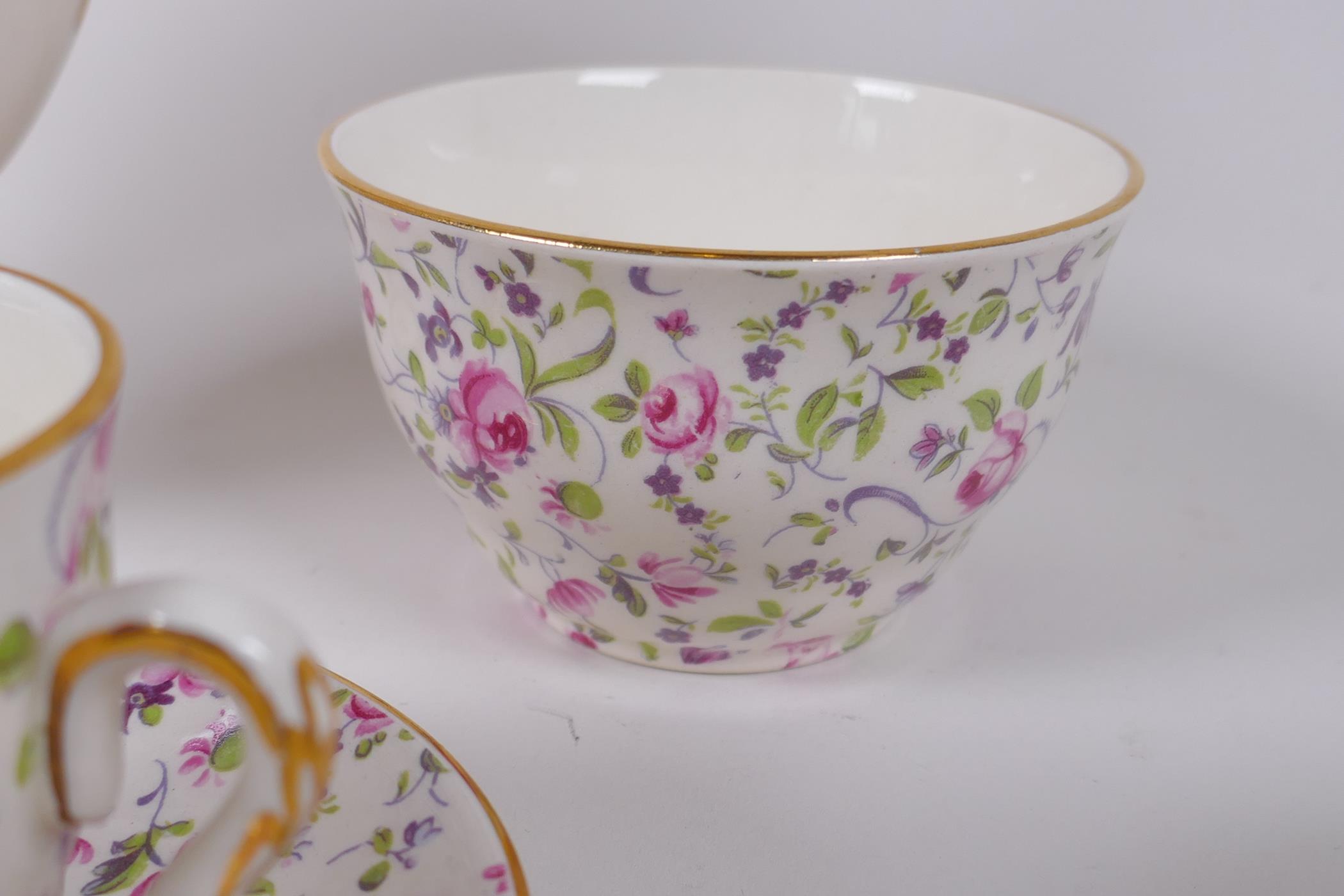 An Arklow pottery six piece coffee set with a transfer printed rose decoration, one cup different, - Image 5 of 7