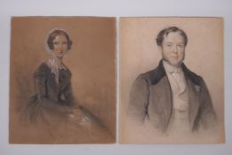 A pair of portraits, a lady and gentleman, C19th charcoal drawings, highlighted with white,