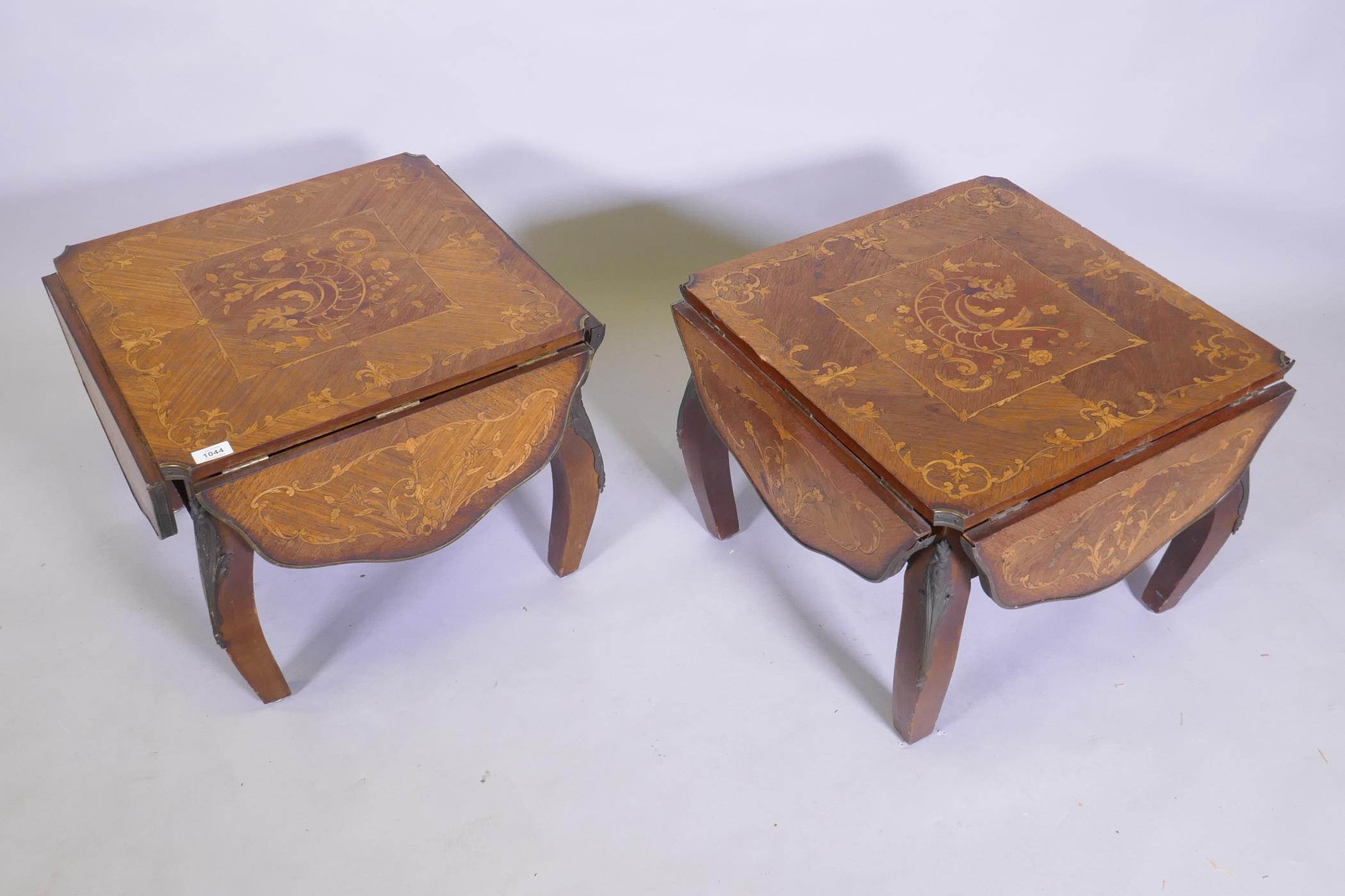 A pair of antique marquetry inlaid kingwood tables with a shaped top and ormolu mounts, reduced, - Image 2 of 5
