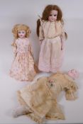 An Armand Marseille bisque headed doll, No 370 5/0, with sleeping eyes, circa 1900, together with