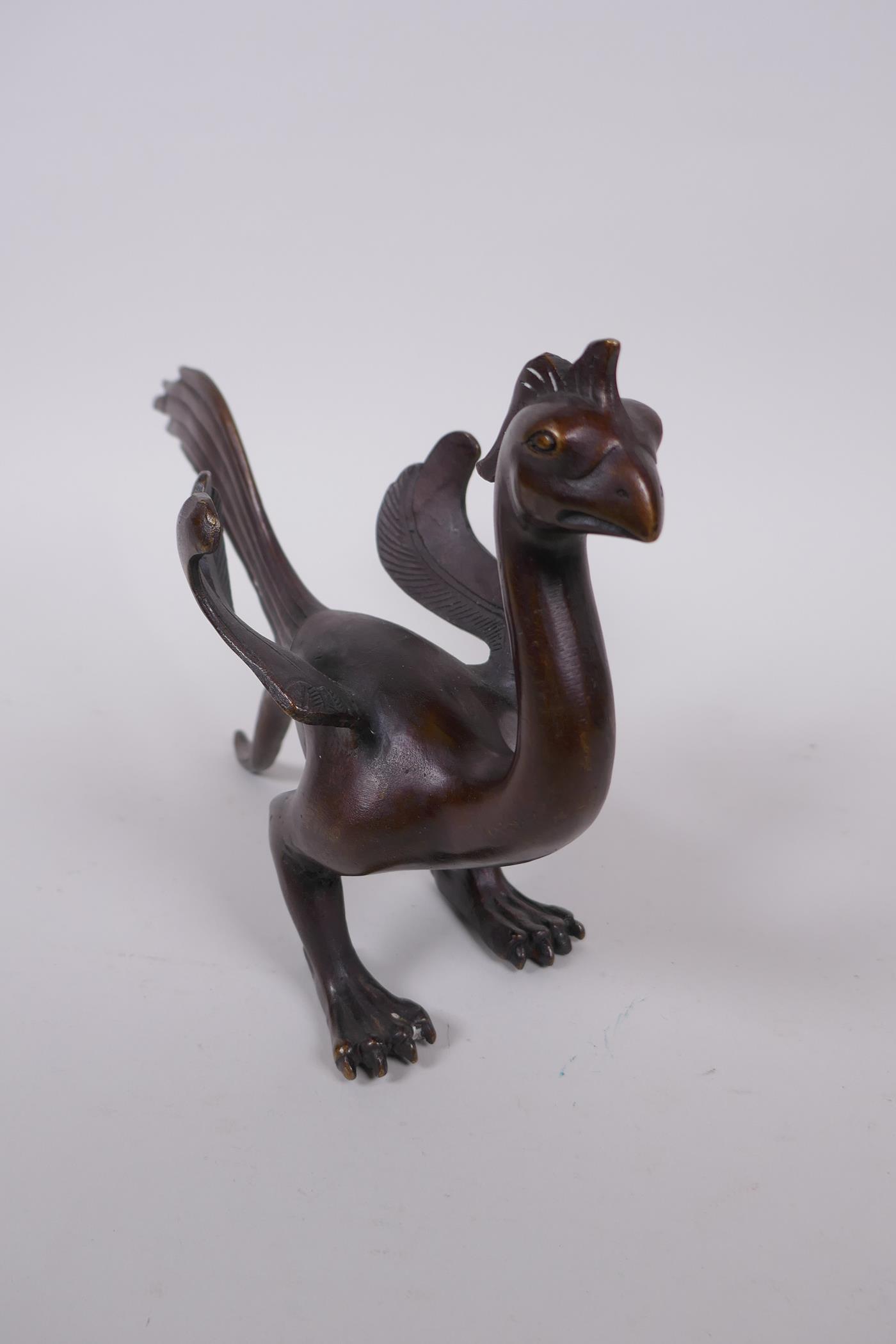 A Chinese filled bronze phoenix, 27cm long - Image 2 of 3