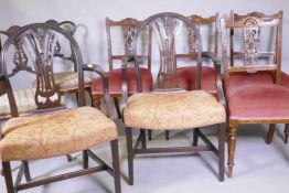 A pair of Hepplewhite style arm chairs, a pair of Victorian side-chairs, with carved and pierced