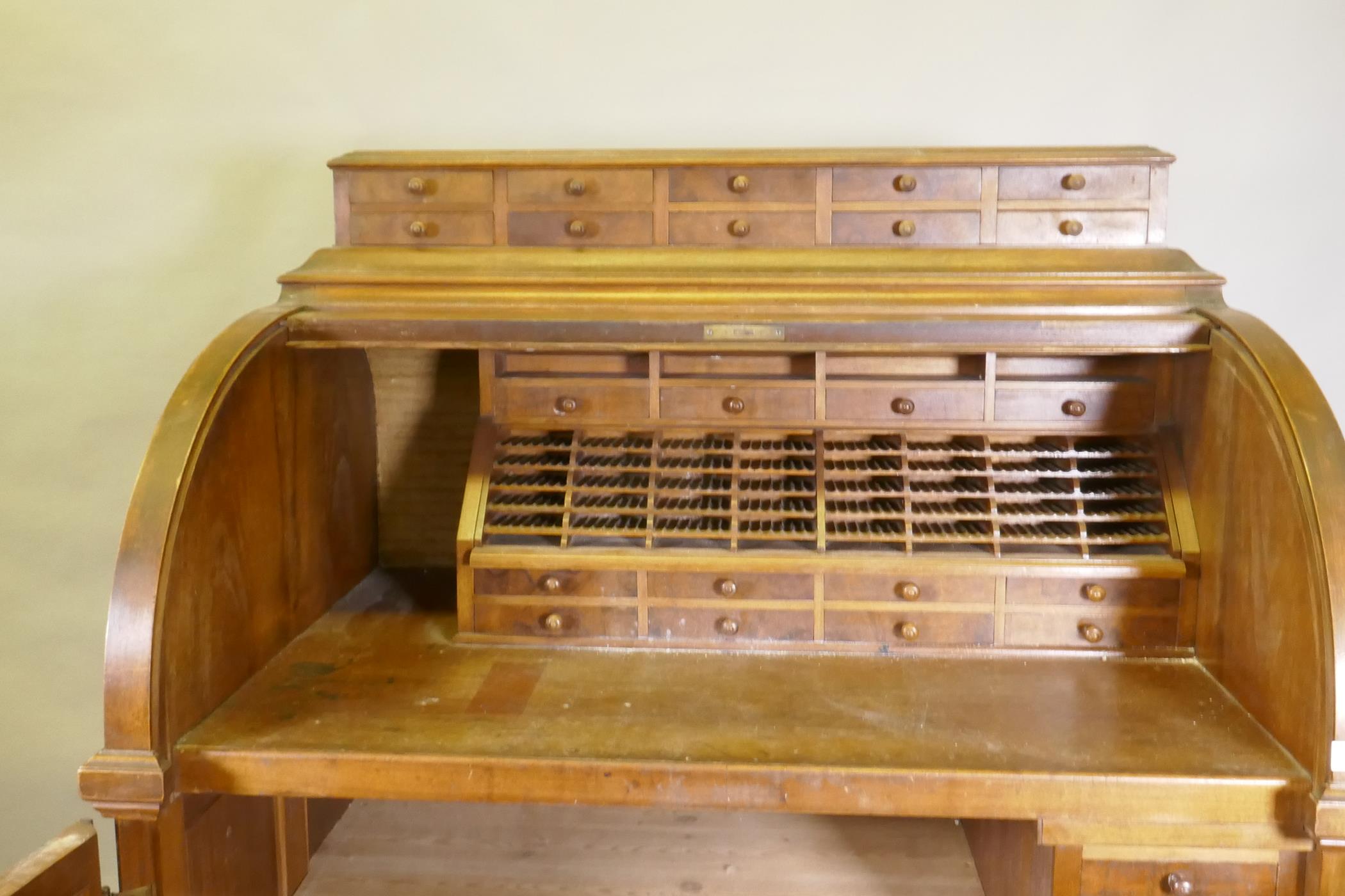 A late C19th/early C20th walnut tobacconist's shop cabinet, the roll top opening to reveal drawers - Image 3 of 5
