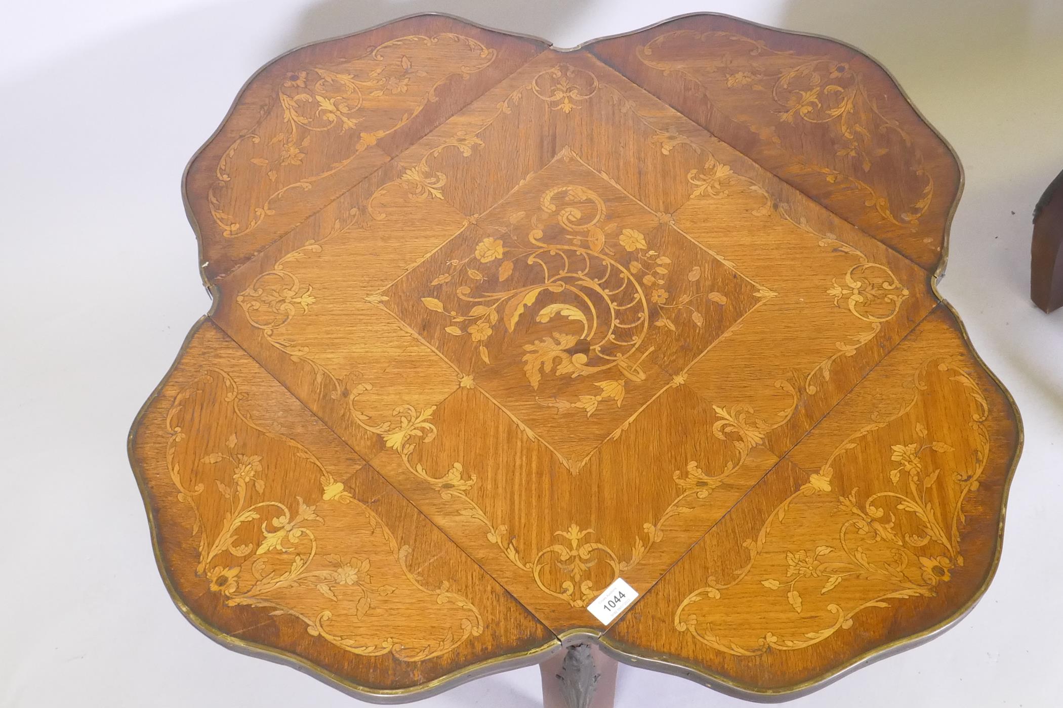 A pair of antique marquetry inlaid kingwood tables with a shaped top and ormolu mounts, reduced, - Image 5 of 5