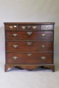 An early C18th oak chest of three over three drawers, with scratched and moulded detail on the
