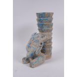 An Islamic earthenware mask vase with turquoise crackle glaze, 25cm high