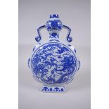 A Chinese blue and white porcelain two handled moon flask of hexagonal form, decorated with a dragon