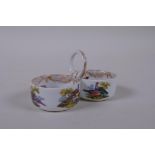 A C19th Meissen porcelain double salt with loop handle and hand painted bird decoration, mark to