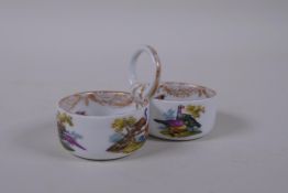 A C19th Meissen porcelain double salt with loop handle and hand painted bird decoration, mark to