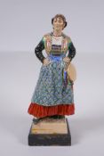 A 1930s Dulwich pottery figure by Jessamine Bray & Sybil Williams, Girl from Trento, mounted on a