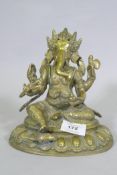 Indian brass figure of Ganesh with a rat under foot, 20cm high