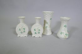 A pair of Beleek porcelain vases and two others, largest 14cm high