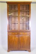 A George III mahogany bookcase, the upper section with astragal glazed doors and adjustable shelves,