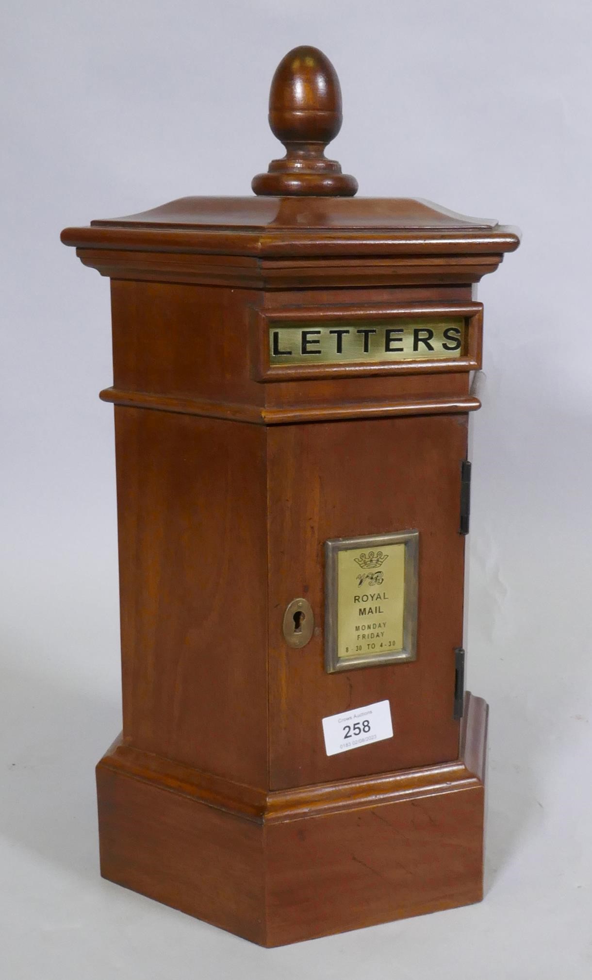 A Victorian style mahogany hexagonal shaped desk letter box, 46cm high