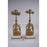 A near pair of antique ormolu and marble candlesticks in the form of a lady with a lyre, 41cm high