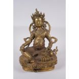 A Tibetan bronze figure of a wrathful deity, impressed double vajra mark to base, 29cm high