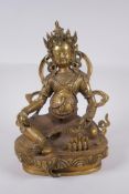 A Tibetan bronze figure of a wrathful deity, impressed double vajra mark to base, 29cm high