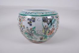 A famille vert porcelain jar with decorative panels depicting the immortals, birds and flowers,