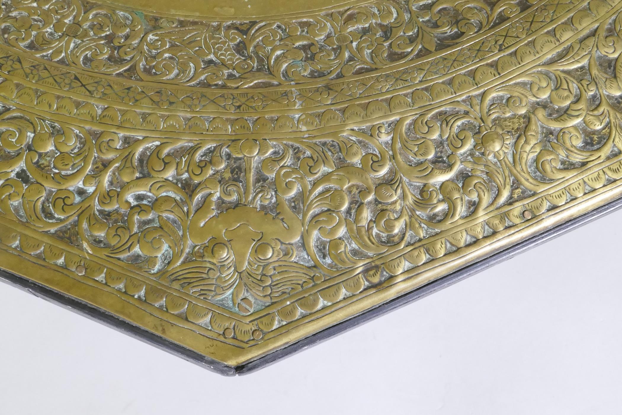 An antique Indo Persian octagonal brass tray table with repousse elephant and bird decoration, - Image 6 of 6