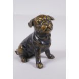 A filled bronze figure of a pug dog, 17cm high