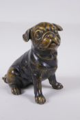 A filled bronze figure of a pug dog, 17cm high