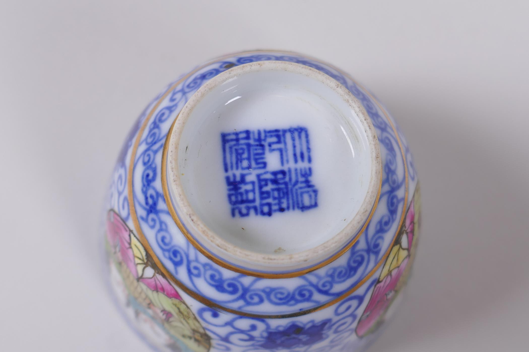 A pair of Chinese blue and white porcelain tea bowls with polychrome enamels panels depicting two - Image 5 of 5