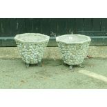 A pair of concrete garden planters, 34cm high