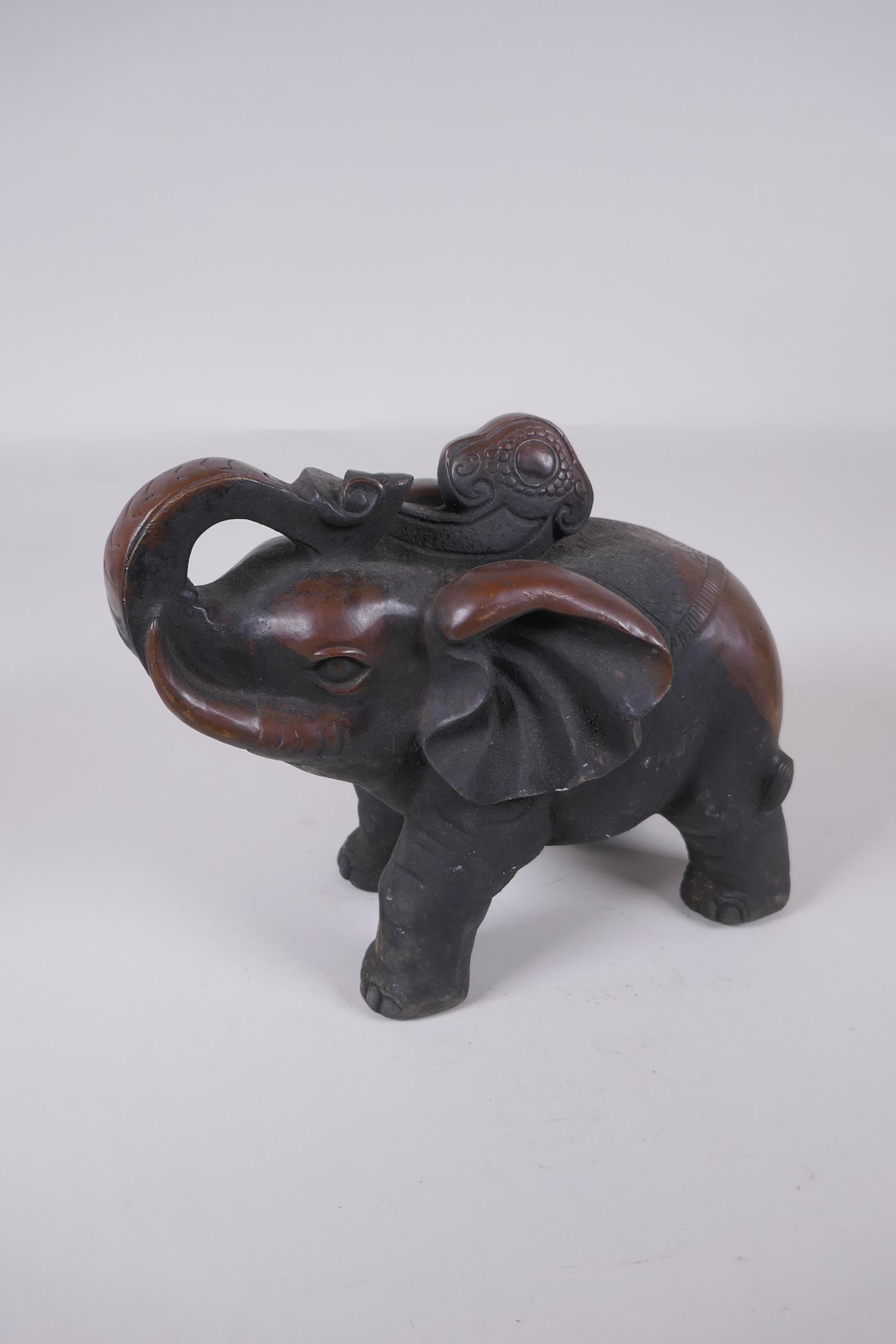 An oriental bronze figure of an elephant, 29cm long - Image 2 of 3