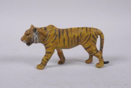 A cold painted bronze tiger, after Bergmann, 10cm long