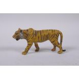 A cold painted bronze tiger, after Bergmann, 10cm long