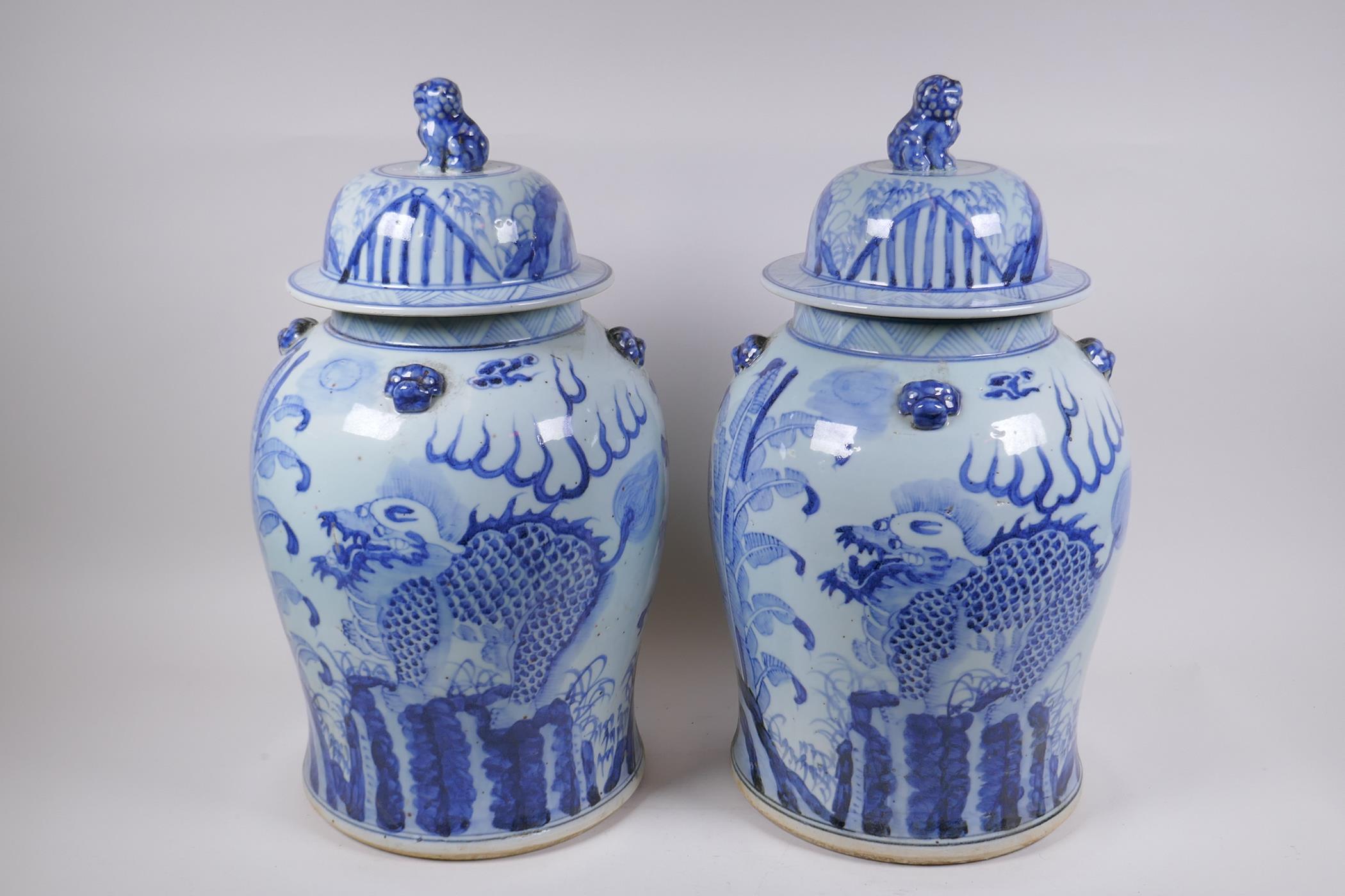 A pair of Chinese blue and white porcelain jars and covers with lion mask, kylin and Fo-dog - Image 4 of 6