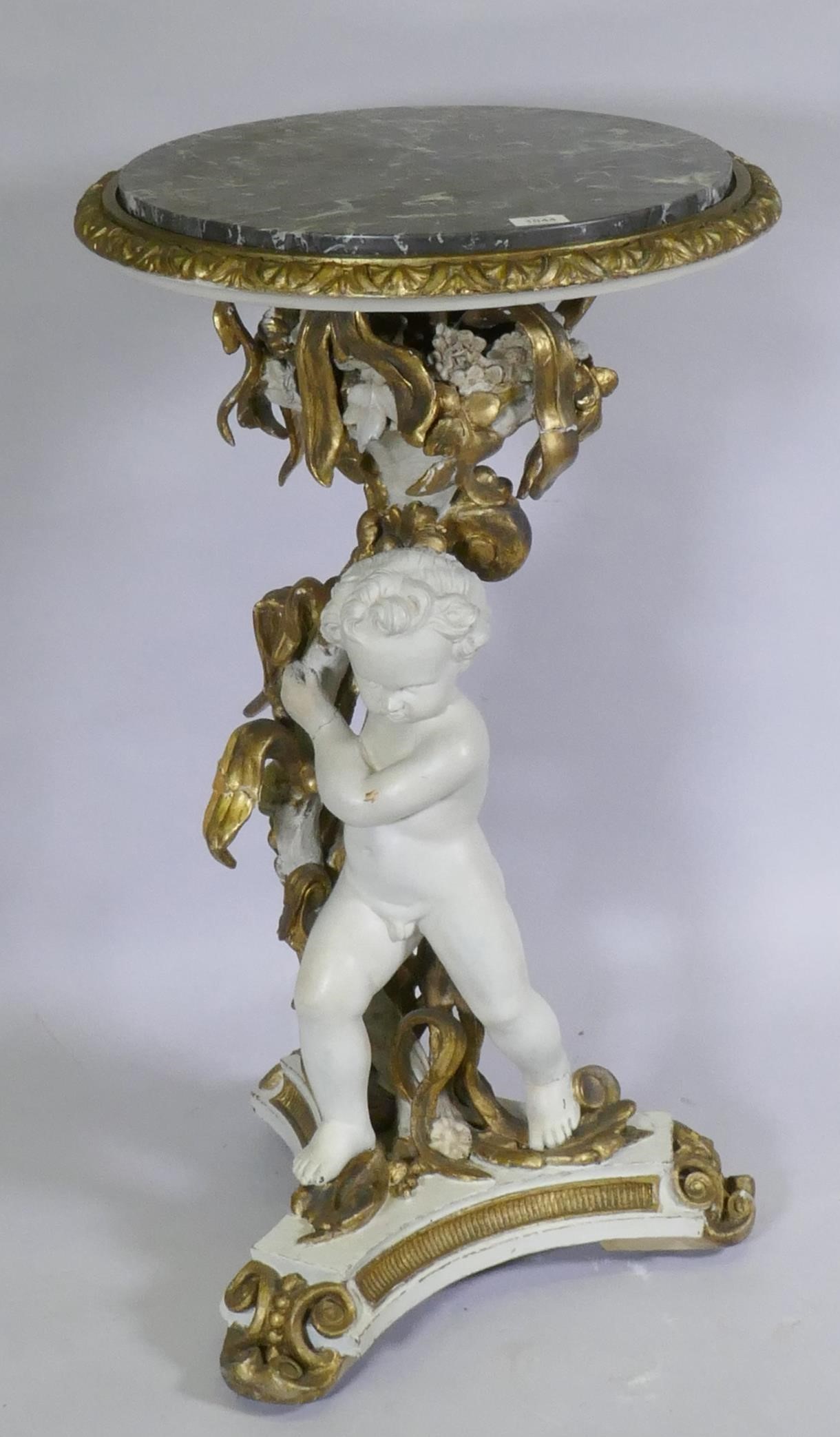 C19th Italian table/stand with painted and parcel gilt decoration in the form of a putto bearing a