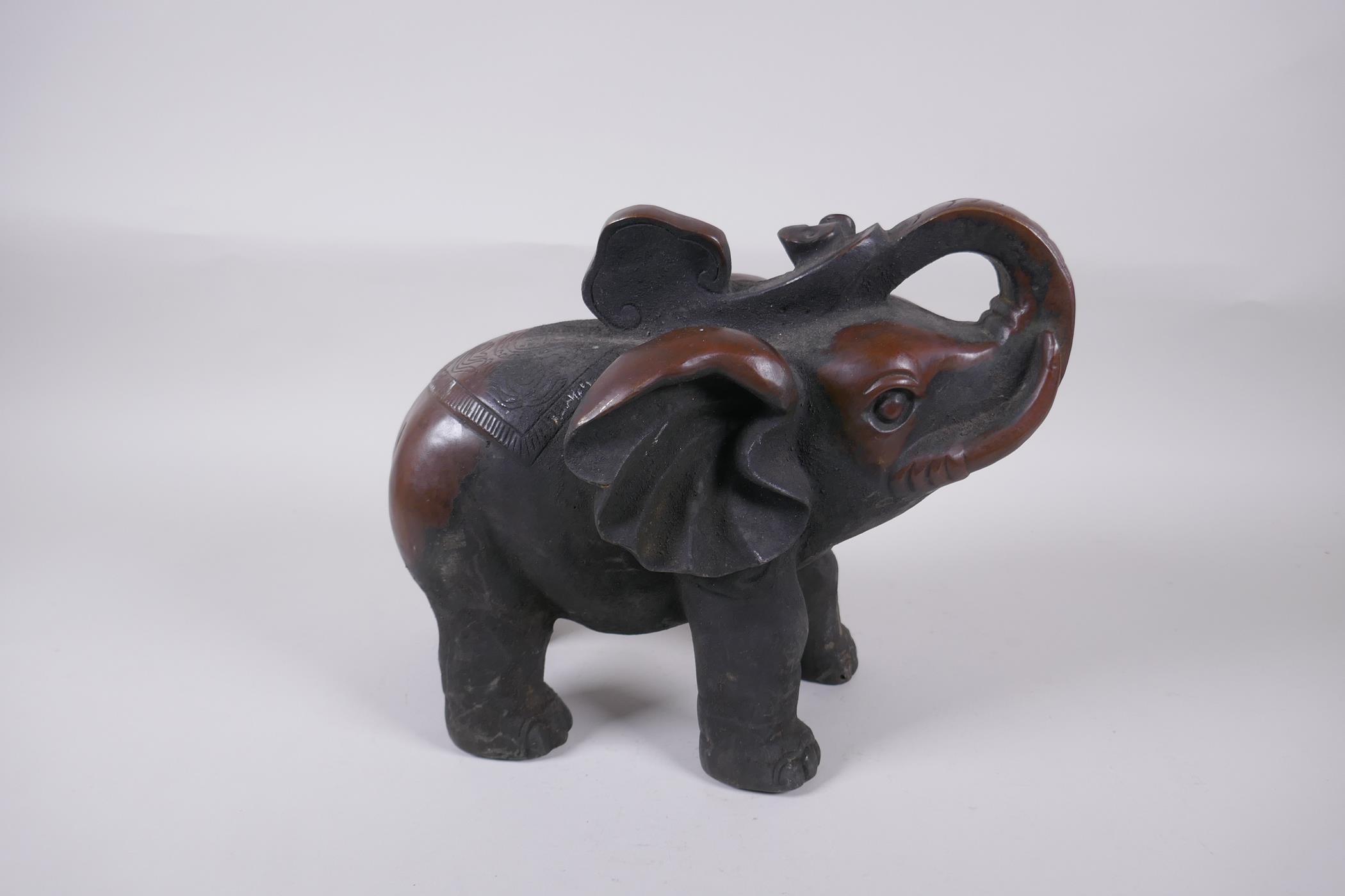 An oriental bronze figure of an elephant, 29cm long - Image 3 of 3