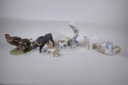 A collection of ceramic animal figures to include Lladro and Nao kittens, a Bing & Grondhal polar