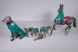 Five Tibetan mixed metal animal figures with inset turquoise and red stone shards, and a similar