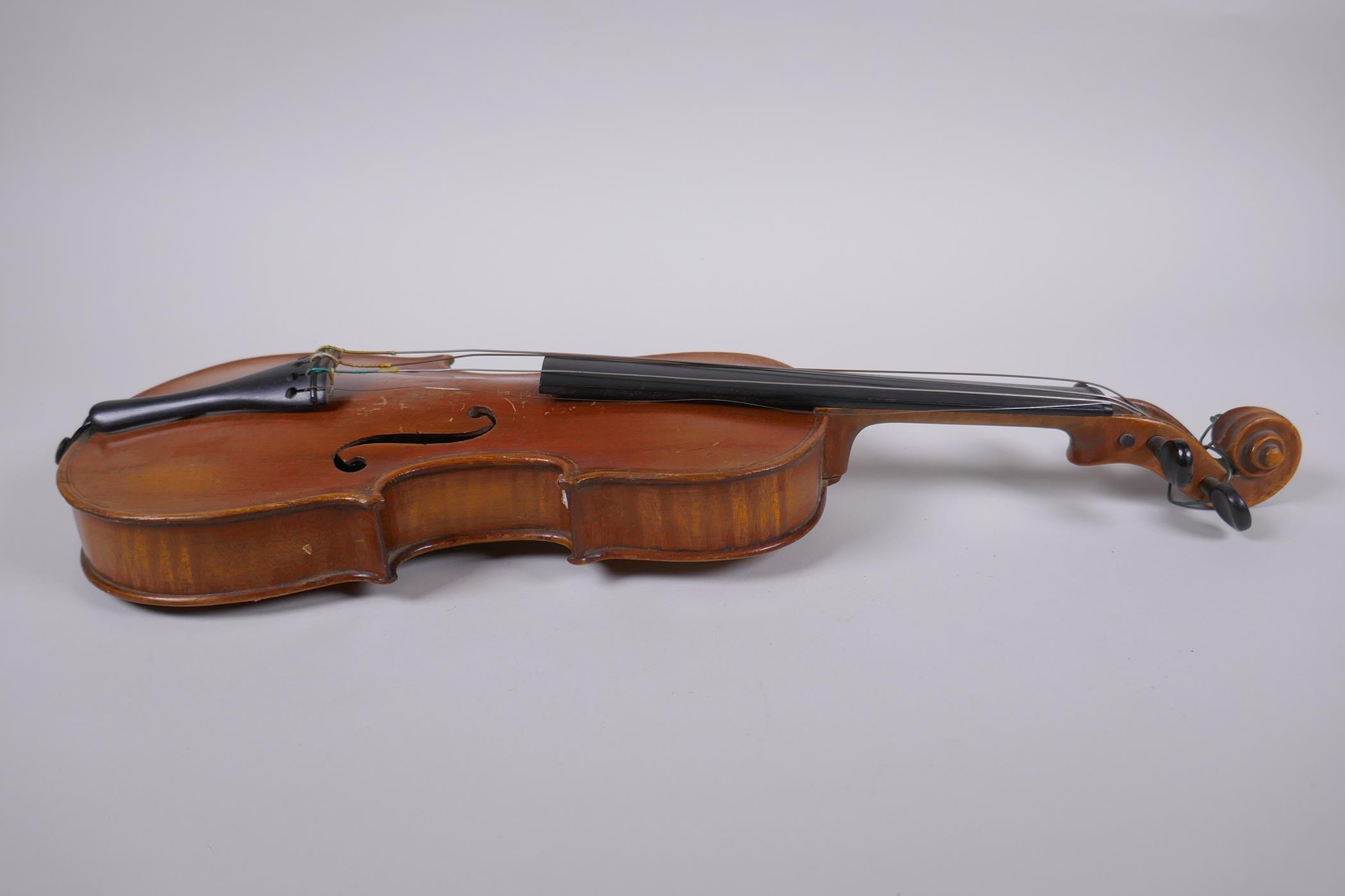 An antique half size violin with a two piece back and ebony finger board, 46cm long - Image 5 of 5