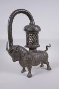 A Sino Tibetan bronze lantern in the form of a bull, 37cm high
