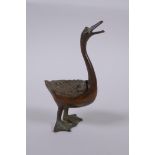 A Chinese bronze censer in the form of a duck, indistinct mark to belly, 12cm high