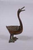 A Chinese bronze censer in the form of a duck, indistinct mark to belly, 12cm high