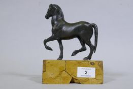 A C19th Grand Tour bronze figure of a horse, mounted on a marble base, 18cm high