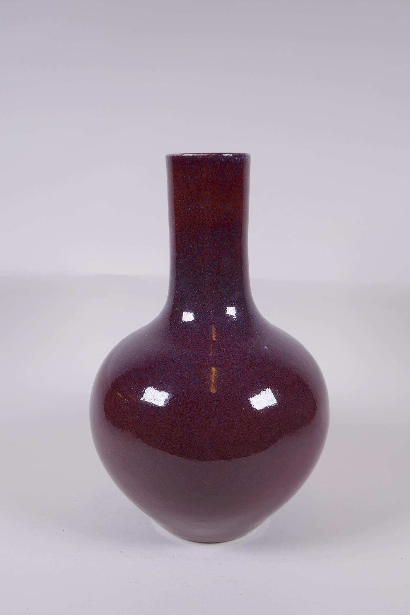 A Chinese flambe glazed porcelain bottle vase, Yong Zheng 6 character mark to base, 33cm high - Image 2 of 5