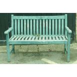 A painted teak garden bench, 124cm wide