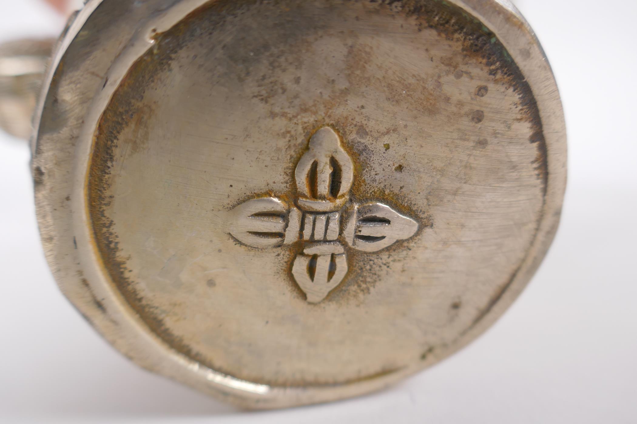 A Tibetan white metal ewer, double vajra mark to base, 20cm high - Image 6 of 6