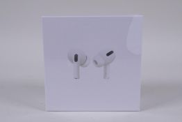 A pair of unopened Apple AirPods Pro with a MagSafe charging case, RRP £249